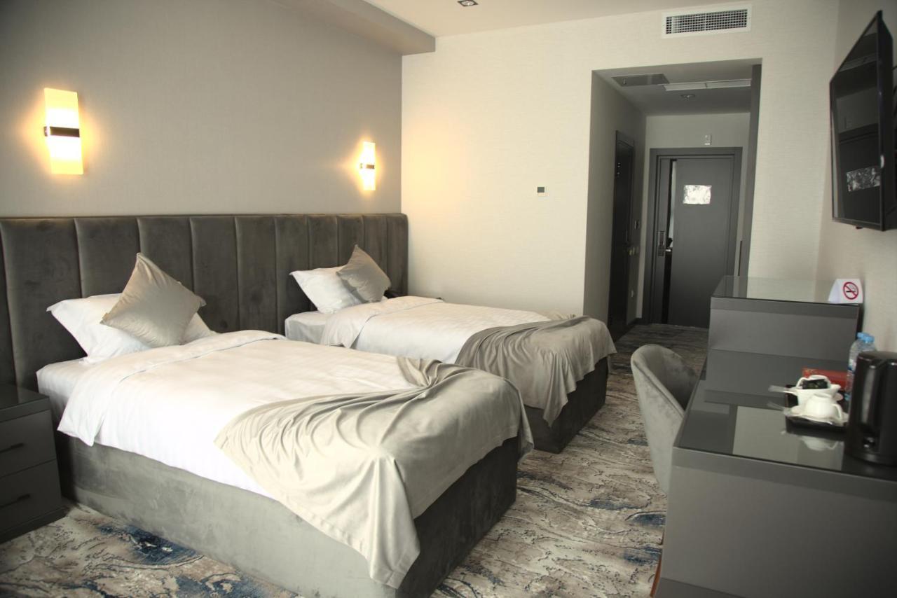 Unique Hotel Tachkent Extérieur photo