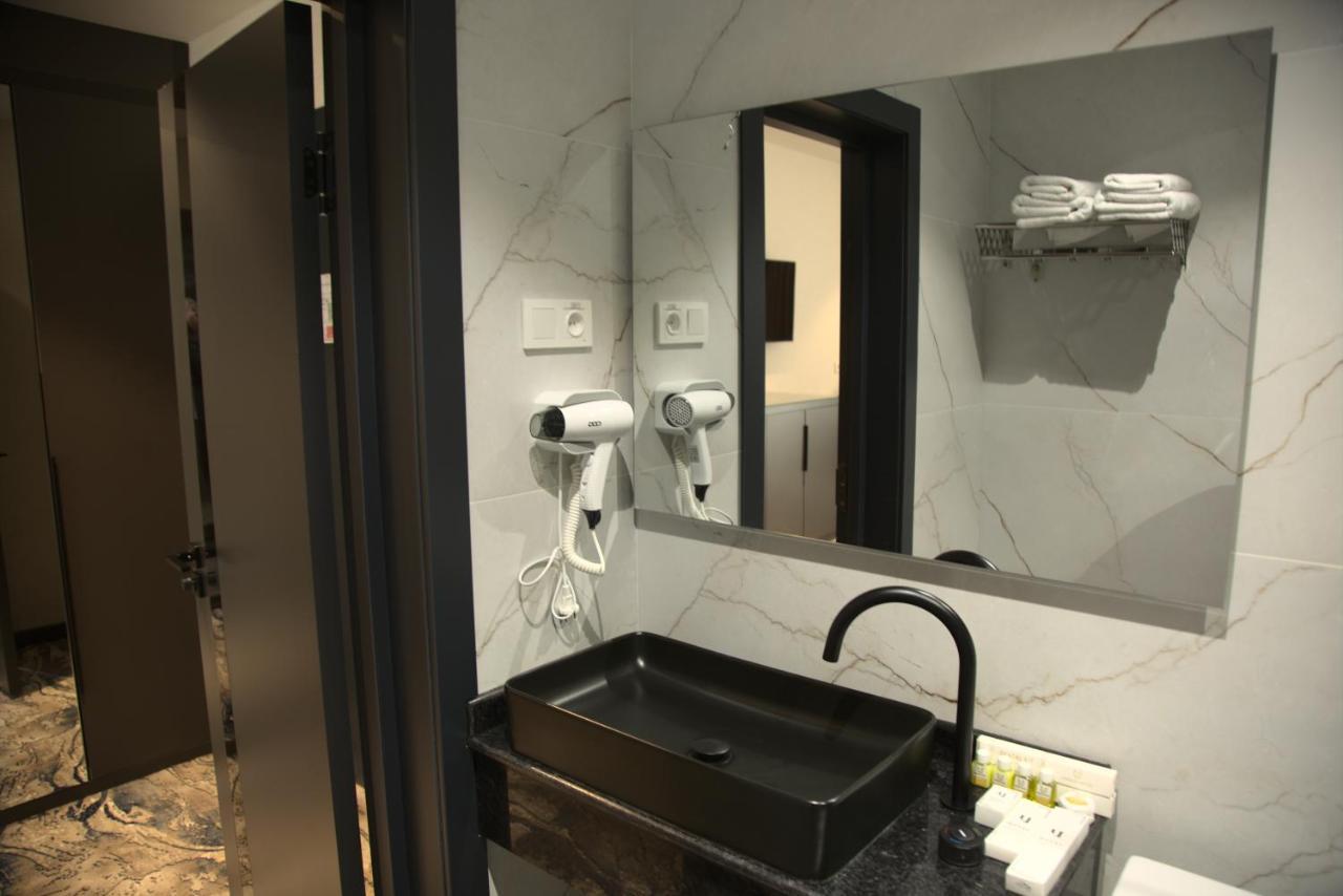 Unique Hotel Tachkent Extérieur photo